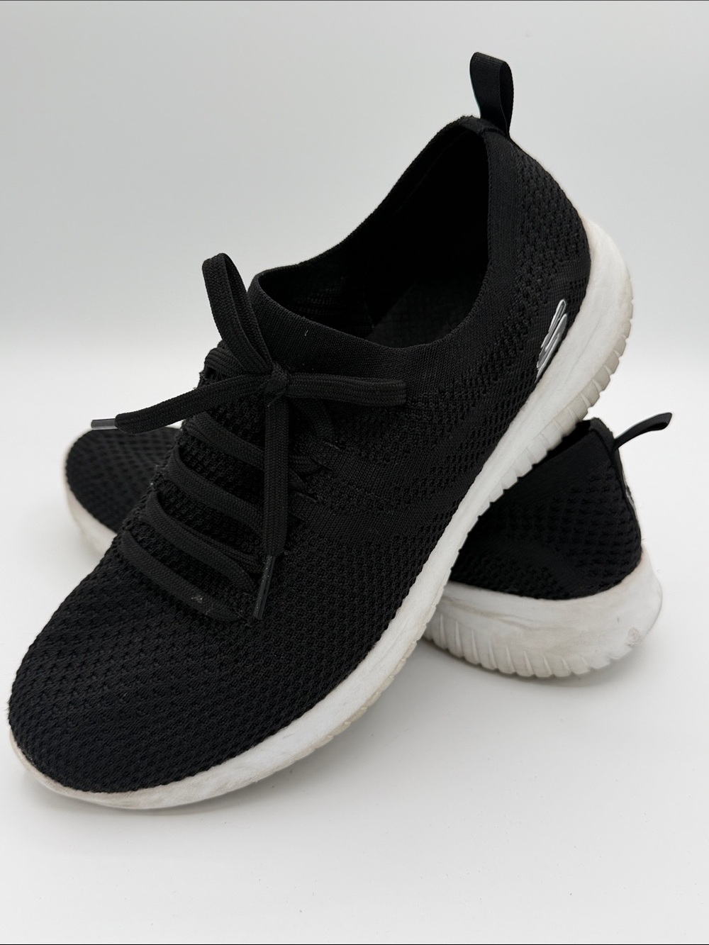 Skechers Black Knit Slip-On Athletic Sneaker with White Sole